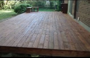Wilburn's pressure treated deck with cedar brown stain