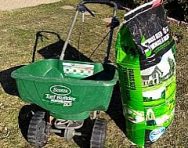 lawn seed with spreader on a lawn